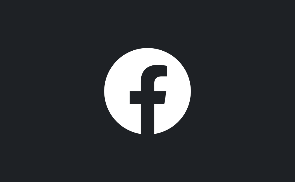 Logo Facebook sur fond sombre