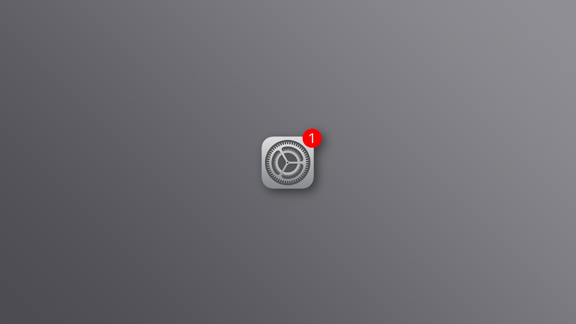 The iPhone's Settings icon with red badge, set against a gray background.