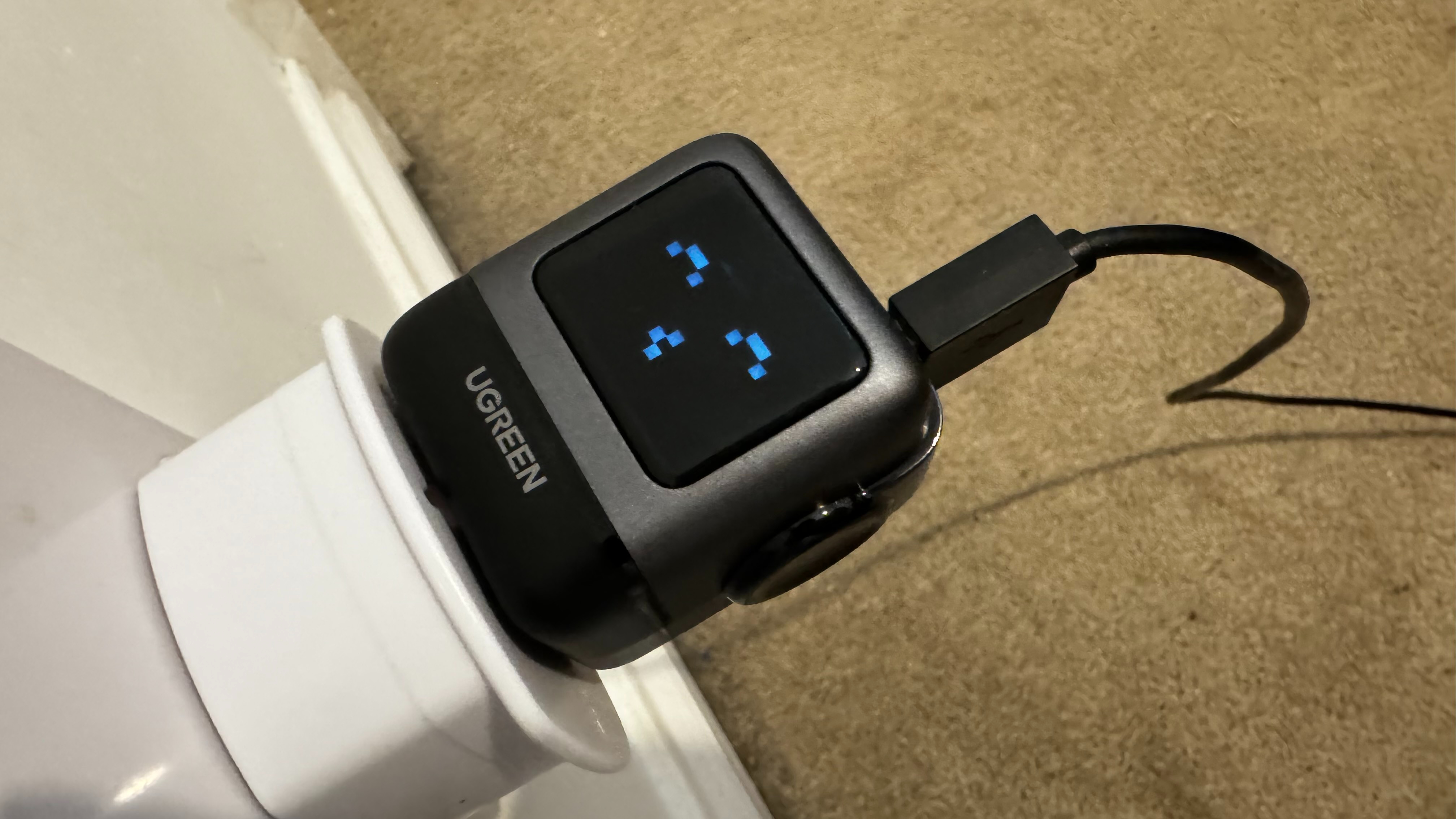 The Nexode RG 65W charger in a plug