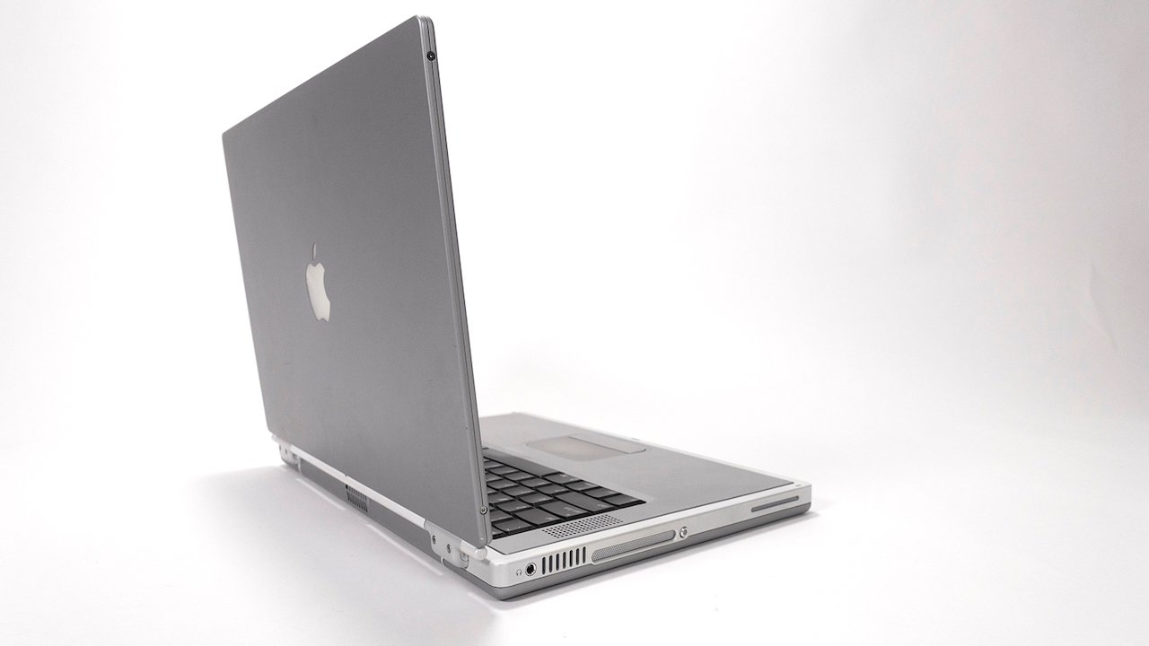 Titanium G4 PowerBook on a white background